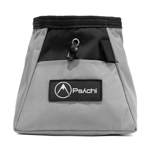 A light grey and black bouldering chalk bucket with drawstring closure and climbing accessory pockets