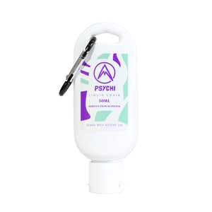 A white recyclable bottle with green and purple label, and psychi climbing shop logo, containing 50ml of sustainable liquid chalk for climbing and a carabiner which isn't intended for climber use