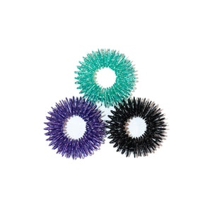 A set of three finger massage coils for climbers rehab in teal, purple and black