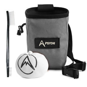 A grey climbing chalk bag and chalk for beginner climbers and bouldering. Includes chalk bag, brush and chalk ball.