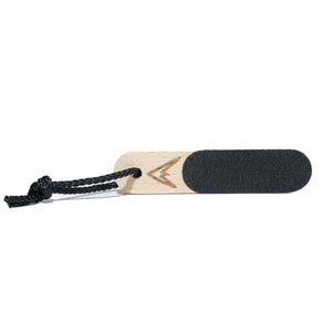 A wooden finger skin file for climbers with a black rope attachment