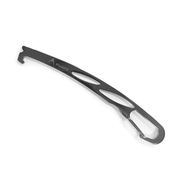 Thin silver metal nut remover, with two holes in the shaft and carabiner clip at the end.