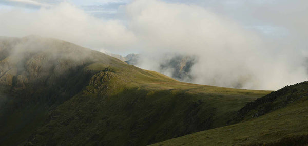 A cloudy ridge at the top of red pike mountain above buttmere in the lake district