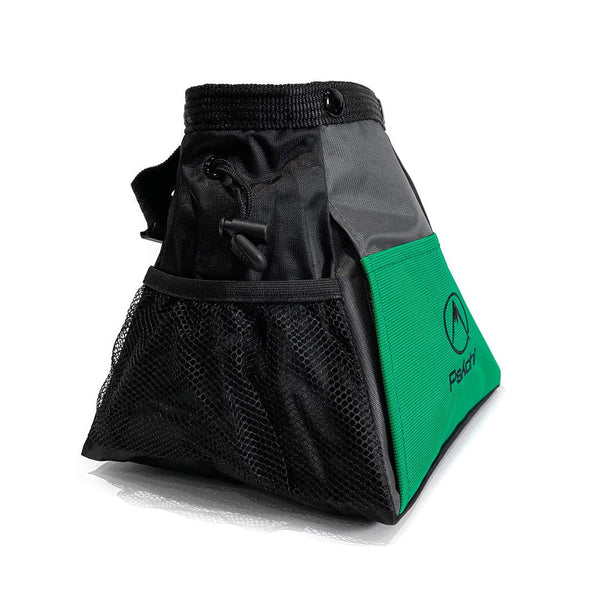 The side pocket of a green bouldering chalk bag