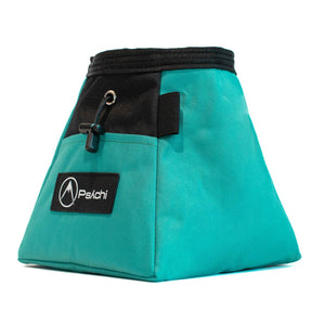 A turquoise and black bouldering chalk bucket with drawstring closure and climbing accessory pockets