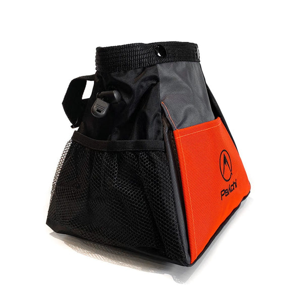 A bright orange bouldering bucket side pocket