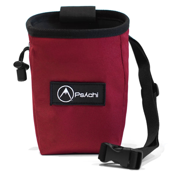 A Dark red rock climbing chalk bag with black and white psychi logo