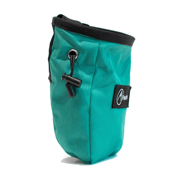 A turquoise rock climbing chalk bag with drawstring closure and Pyschi white mountain logo on a black fabric patch