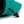 A Drawstring closure toggle on a turquoise climbing chalk bag 