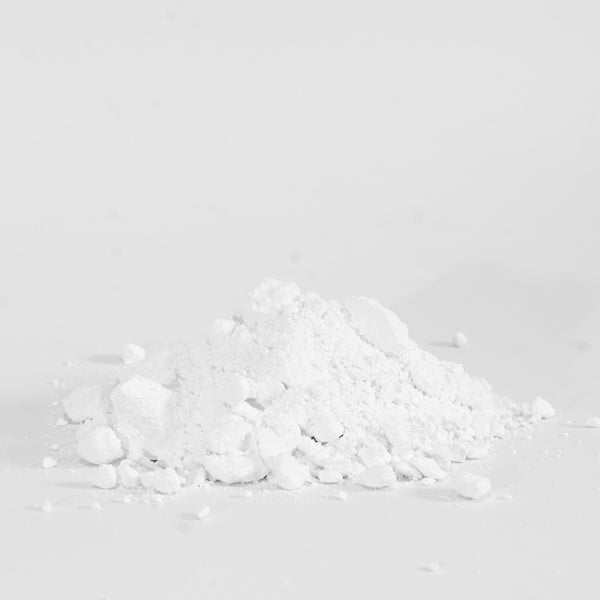 a small pile of rock climbing chalk with fine powder and some small lumps