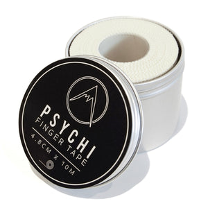 Psychi 4.8cm physio tape in a metal tin with on a white background.
