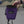 A climber using a purple chalk bag with zip pocket and black patch featuring 'PSYCHI' branding at a climbing centre in Manchester