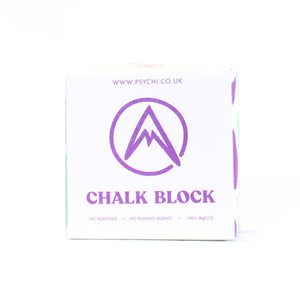 A single climbing chalk block with Psychi mountain logo, on a white background.