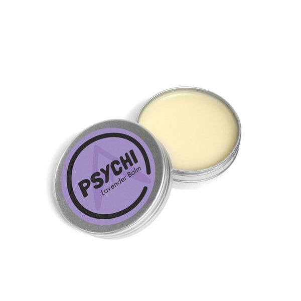 A purple sticker on a metal tin containing lavender scented natural beeswax skin balm for climbers.
