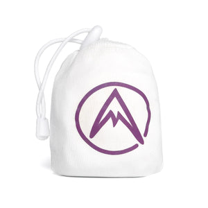 A white refillable chalk ball for rock climbing and weightlifting sports