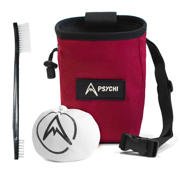 A dark red climbing chalk bag and chalk for beginner climbers and bouldering. Includes chalk bag, brush and ball.