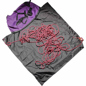 Purple climbing rope bag with a black 1 meter by 1 meter ground sheet on a white background