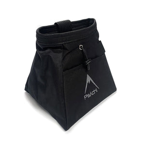 A black bucket bag, with grey mountain psychi logo, front pocket, a wide base, brush holder and a drawstring closure.