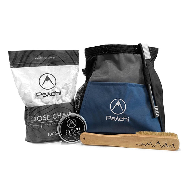 Navy Blue Bouldering Bucket chalk bag with white mountain logo in a pack with climbing chalk, climber tape and a bouldering brushes